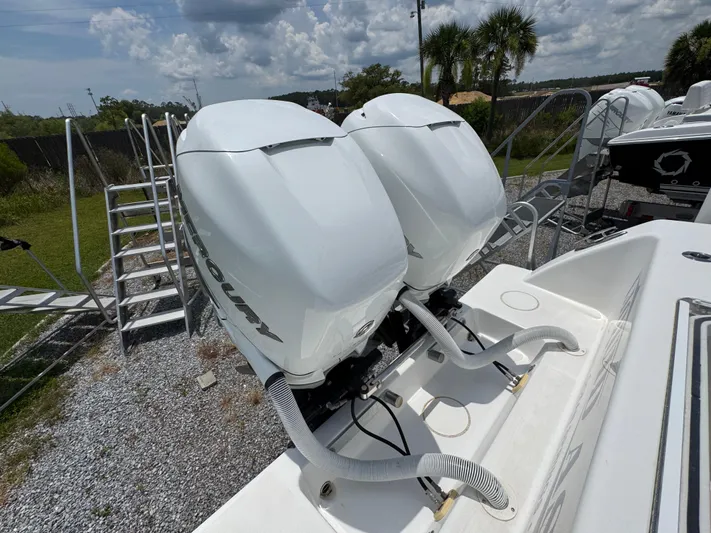 Yacht Photos Pics Twin Mercury outboard engines on a 2017 Invincible 33 Open Fisherman boat.