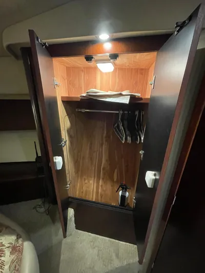 Tivoli II Yacht Photos Pics MASTER STATEROOM CEDAR LINED CLOSET TO STBD.