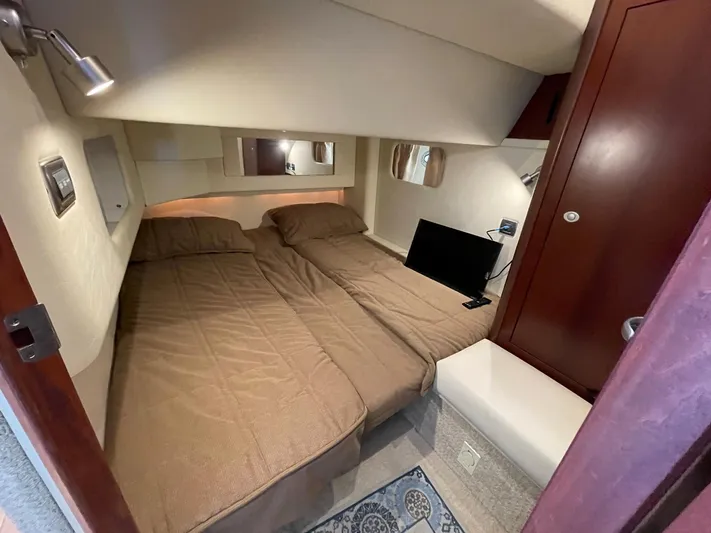 Tivoli II Yacht Photos Pics VIP STATEROOM OVERVIEW W/CEDAR LINED CLOSET & PRIVATE ENTRANCE TO HEAD
