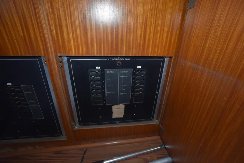 Russell Hatt Yacht Photos Pics Electrical panel on 1988 Hatteras 48 Convertible yacht with wood finish.