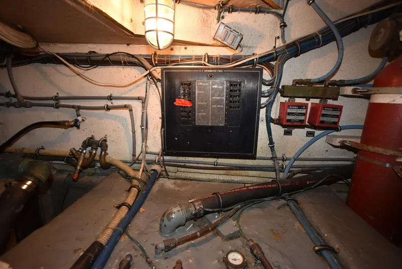 Russell Hatt Yacht Photos Pics Engine room of 1988 Hatteras 48 Convertible with electrical panel and wiring.