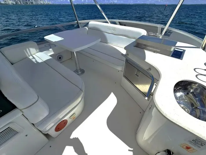  Yacht Photos Pics 2009 Sea Ray 505 Sedan Bridge yacht interior with seating and ocean view.
