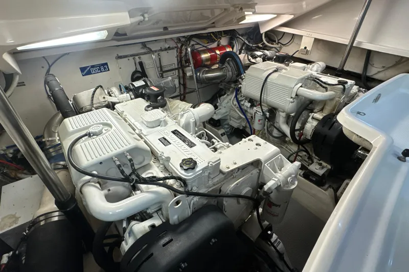 Blue Sky Yacht Photos Pics Engine room of 2006 Tiara Yachts 3600 Sovran, showcasing dual engines and mechanical components.