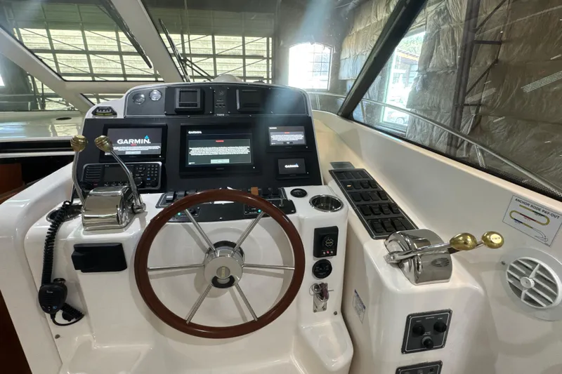 Blue Sky Yacht Photos Pics Helm of 2006 Tiara Yachts 3600 Sovran with Garmin navigation system and controls.