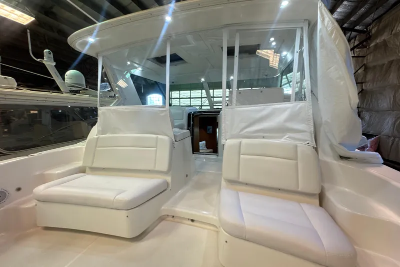 Blue Sky Yacht Photos Pics 2006 Tiara Yachts 3600 Sovran interior with white seating and modern design.