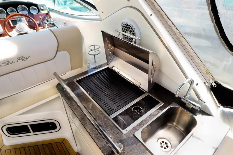 St Babyn Yacht Photos Pics Interior of 2012 Sea Ray Sundancer 310 with grill and sink.