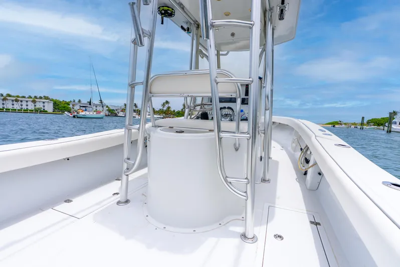  Yacht Photos Pics 2018 Ocean Runner 29 boat on water, featuring sleek design and spacious deck.