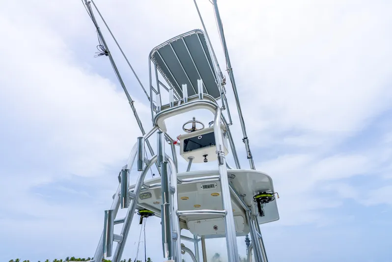  Yacht Photos Pics 2018 Ocean Runner 29 boat tower against a cloudy sky.