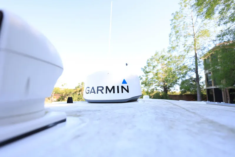  Yacht Photos Pics 2023 Blackfin 252 DC boat with Garmin equipment, outdoor setting, clear sky.