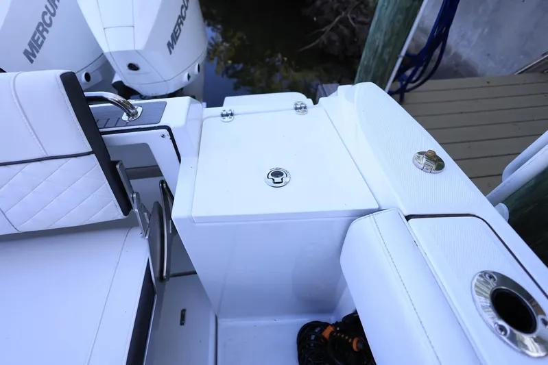  Yacht Photos Pics 2023 Blackfin 252 DC boat interior with white seating and Mercury engines.