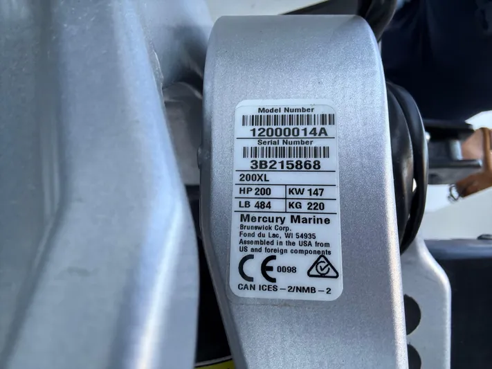  Yacht Photos Pics Label on Mercury Marine engine, model 200XL, showing specifications and serial number.