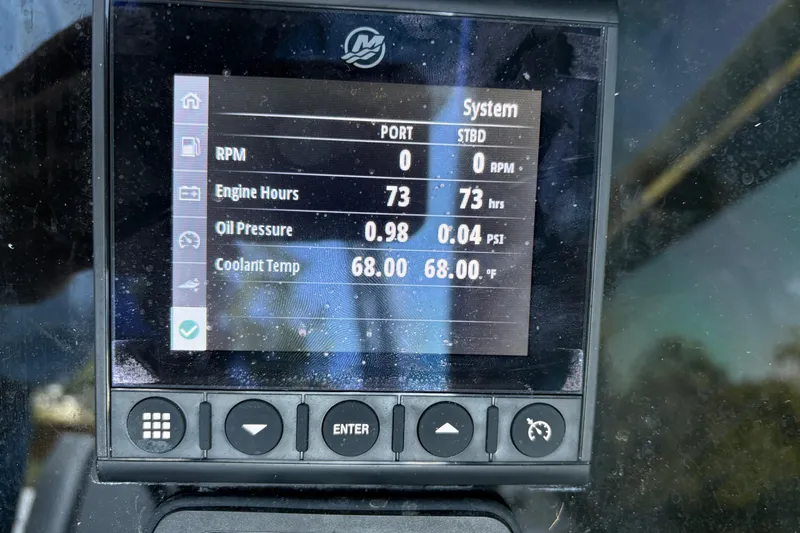  Yacht Photos Pics Display screen of a 2023 Blackfin 252 DC showing engine metrics and system status.