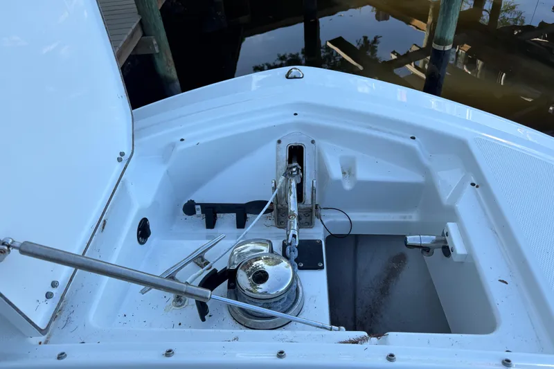  Yacht Photos Pics 2023 Blackfin 252 DC boat anchor compartment with winch and chain.