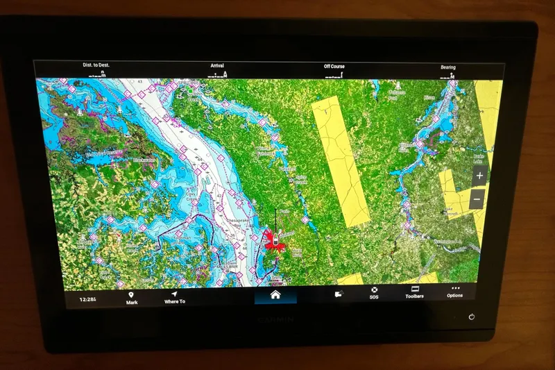 Esc Key Yacht Photos Pics Garmin marine navigation display on 2023 Back Cove 39O, showing detailed coastal map.