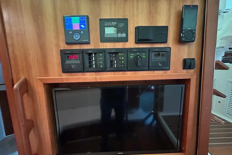 Esc Key Yacht Photos Pics Distribution panel, mid cabin TV, VHF with AIS, and invertor/charger
