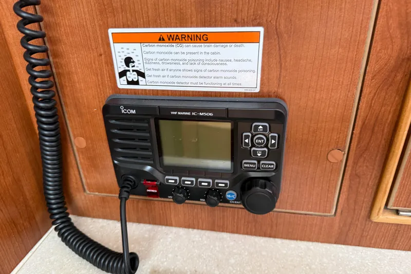 Sirenia Yacht Photos Pics VHF marine radio on Gemini Legacy 35, 2014 model, with carbon monoxide warning label.