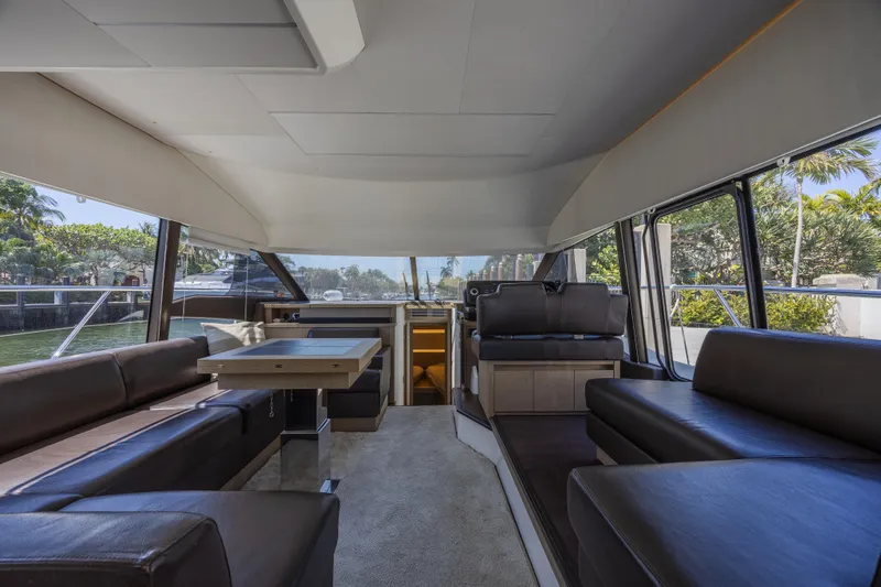 Aura Yacht Photos Pics Luxurious interior of 2018 Prestige 520 yacht with spacious seating and modern design.