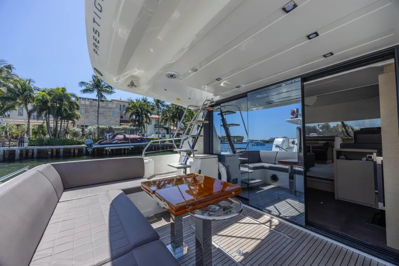 Aura Yacht Photos Pics Luxurious 2018 Prestige 520 yacht with spacious deck and modern interior design.