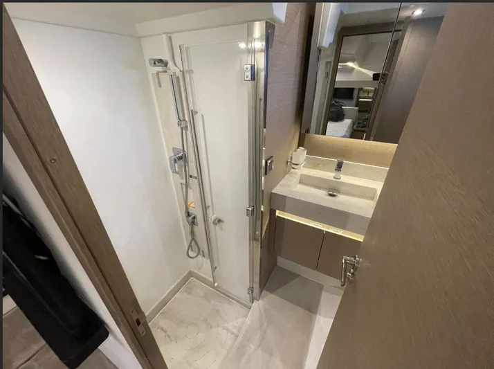 Aura Yacht Photos Pics Modern bathroom in 2018 Prestige 520 yacht with shower and sink.