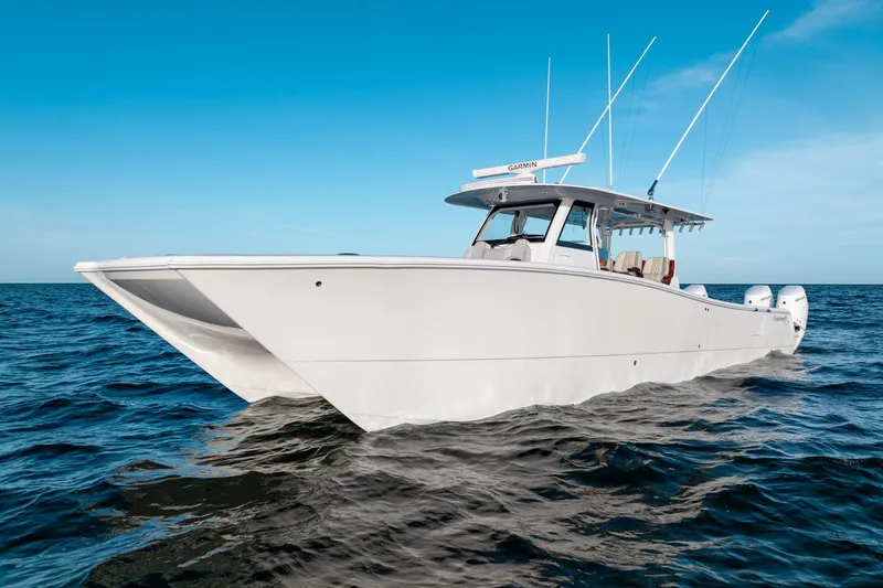  Yacht Photos Pics 2023 Freeman 43 boat on open sea under clear blue sky.