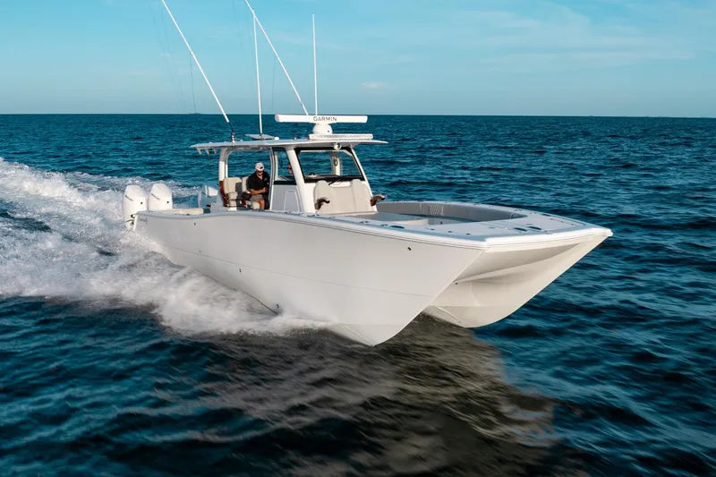  Yacht Photos Pics 2023 Freeman 43 boat cruising on open ocean waters.