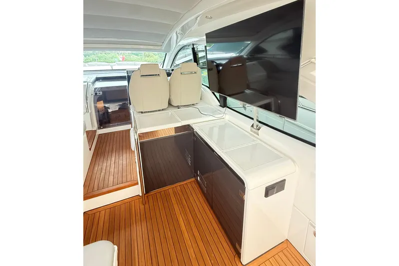 2024 Fairline Targa 50 Open @ Cancun Yacht Photos Pics 2024 Fairline Targa 50 Open yacht interior with sleek design and wooden flooring.