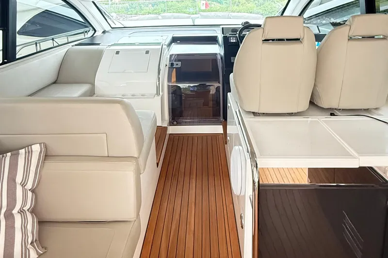 2024 Fairline Targa 50 Open @ Cancun Yacht Photos Pics Interior of 2024 Fairline Targa 50 Open yacht with modern seating and wooden flooring.
