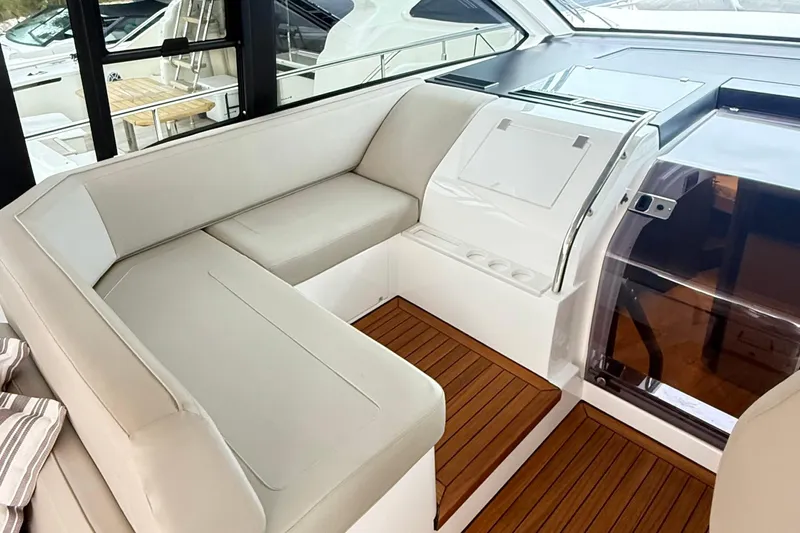 2024 Fairline Targa 50 Open @ Cancun Yacht Photos Pics 2024 Fairline Targa 50 Open yacht interior with elegant seating and wooden flooring.
