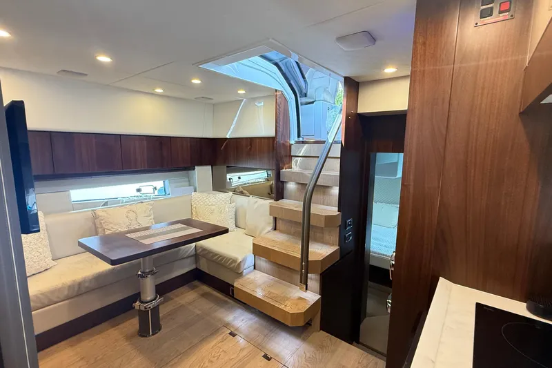 2024 Fairline Targa 50 Open @ Cancun Yacht Photos Pics Luxurious interior of 2024 Fairline Targa 50 Open yacht with elegant wood finishes.