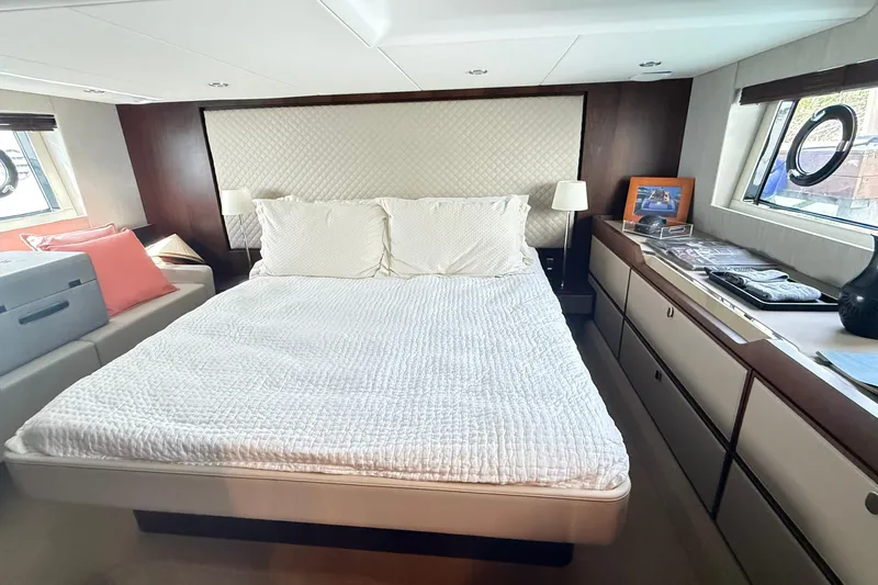 2024 Fairline Targa 50 Open @ Cancun Yacht Photos Pics Luxurious bedroom interior of 2024 Fairline Targa 50 Open yacht, featuring elegant design and ample storage.