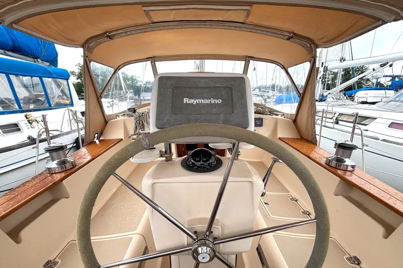 Blue Sky Yacht Photos Pics Cockpit of 2001 Island Packet 380 sailboat with Raymarine navigation system.