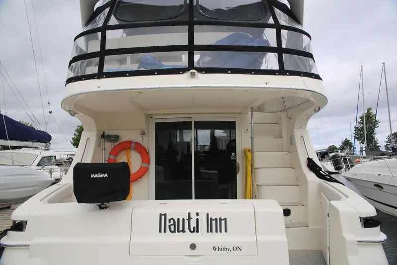  Yacht Photos Pics Cockpit with stairs leading to the Bridge Deck