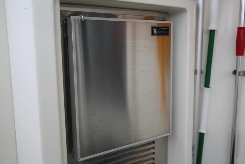  Yacht Photos Pics Stainless steel refrigerator on 2008 Silverton 38 Sport Bridge yacht.