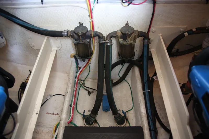  Yacht Photos Pics Engine compartment of a 2008 Silverton 38 Sport Bridge with visible hoses and wiring.