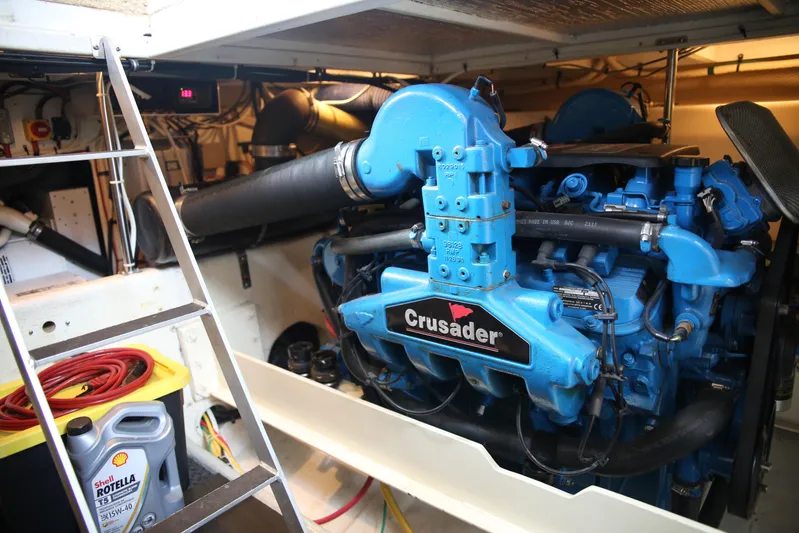  Yacht Photos Pics Engine room of 2008 Silverton 38 Sport Bridge with Crusader engine and maintenance supplies.