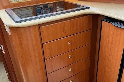  Yacht Photos Pics 2008 Silverton 38 Sport Bridge interior with wooden cabinetry and countertop.