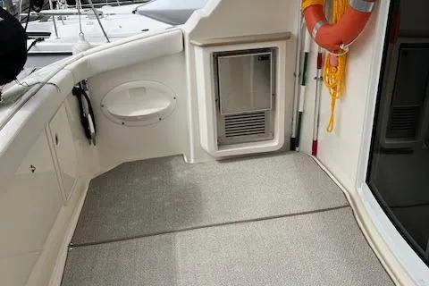  Yacht Photos Pics 2008 Silverton 38 Sport Bridge deck with storage, life preserver, and non-slip flooring.