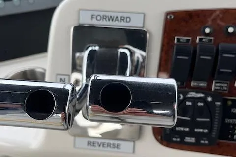  Yacht Photos Pics Close-up of 2008 Silverton 38 Sport Bridge throttle controls, showing forward and reverse levers.