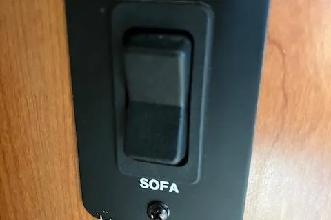 Yacht Photos Pics Switch labeled "Sofa" on 2008 Silverton 38 Sport Bridge yacht interior.