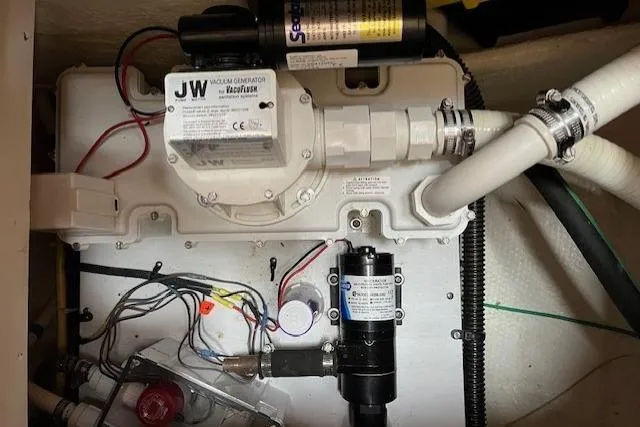  Yacht Photos Pics Engine compartment of a 2008 Silverton 38 Sport Bridge with visible wiring and components.