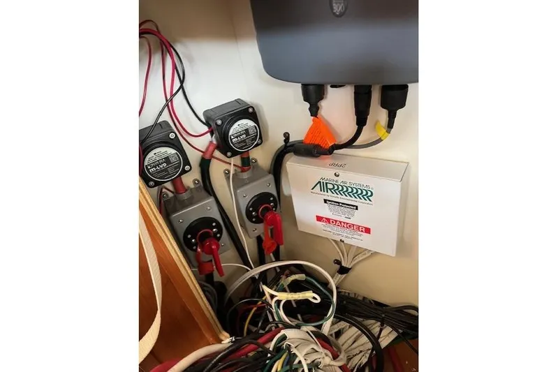  Yacht Photos Pics Electrical panel and wiring inside a 2008 Silverton 38 Sport Bridge boat.