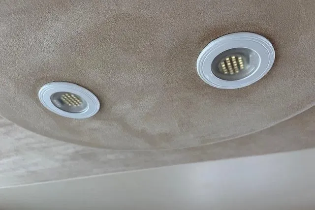  Yacht Photos Pics Ceiling lights inside a 2008 Silverton 38 Sport Bridge yacht interior.