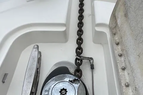  Yacht Photos Pics Anchor chain mechanism on 2008 Silverton 38 Sport Bridge boat deck.