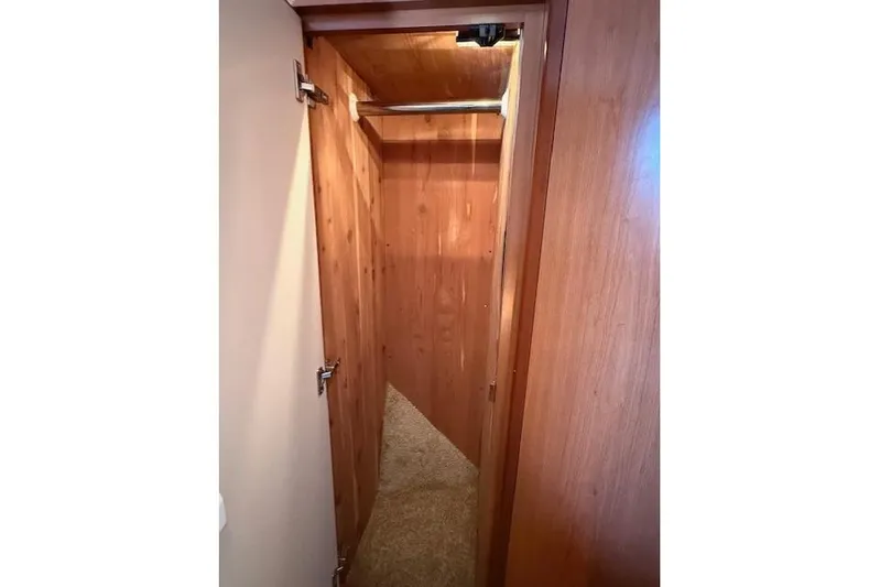  Yacht Photos Pics Wooden closet interior on a 2008 Silverton 38 Sport Bridge yacht.