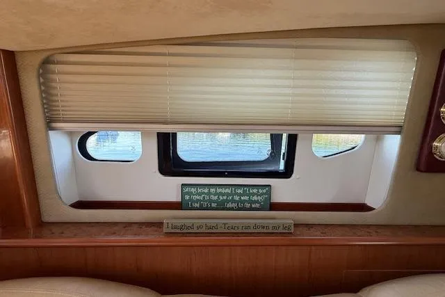  Yacht Photos Pics Interior view of a 2008 Silverton 38 Sport Bridge with window and humorous signs.