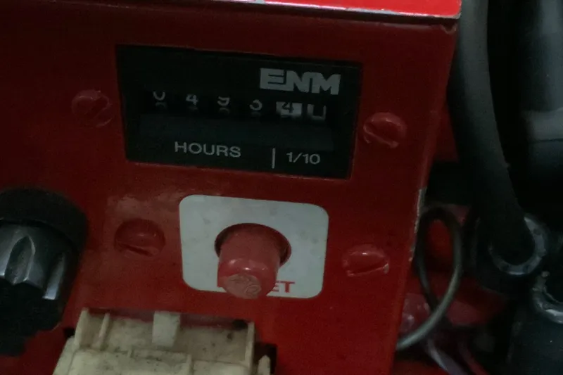 Lou Alice Yacht Photos Pics Hour meter on a 2000 Sea Ray Sundancer boat dashboard.