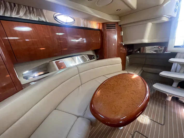  Yacht Photos Pics Luxurious interior of 2004 Sea Ray 360 Sundancer yacht with elegant wood finishes.
