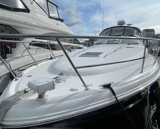  Yacht Photos Pics 2004 Sea Ray 360 Sundancer yacht docked, showcasing sleek design and modern features.