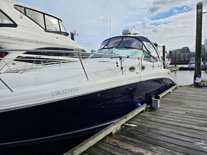  Yacht Photos Pics 2004 Sea Ray 360 Sundancer docked at marina, side view.