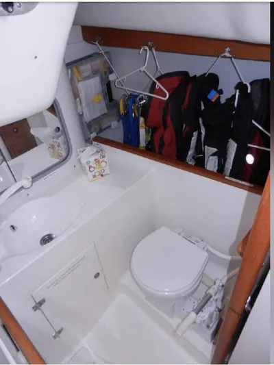 Finezza Veloce Yacht Photos Pics Aft, day head with wet locker